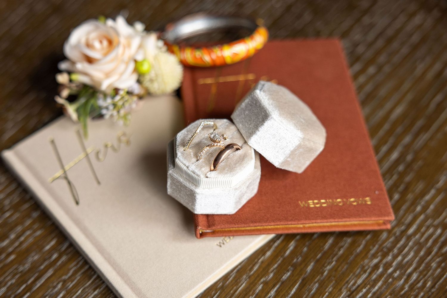 Wedding rings velvet box vow books photography