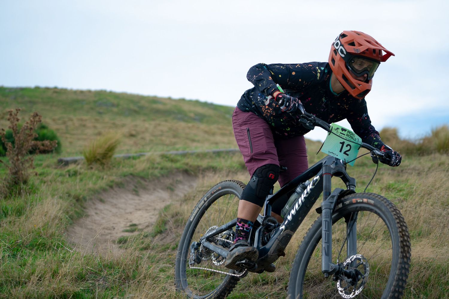 Female navigates challenging downhill mountain bike trails in an outdoor adventure setting at the Crocodile Mountain Bike Park in Halswell.