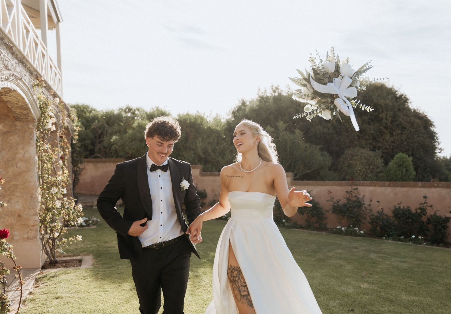 Candid wedding photos showing movement and laughter in an outdoor garden setting. Alton house wedding, Port Willunga images by braytmedia