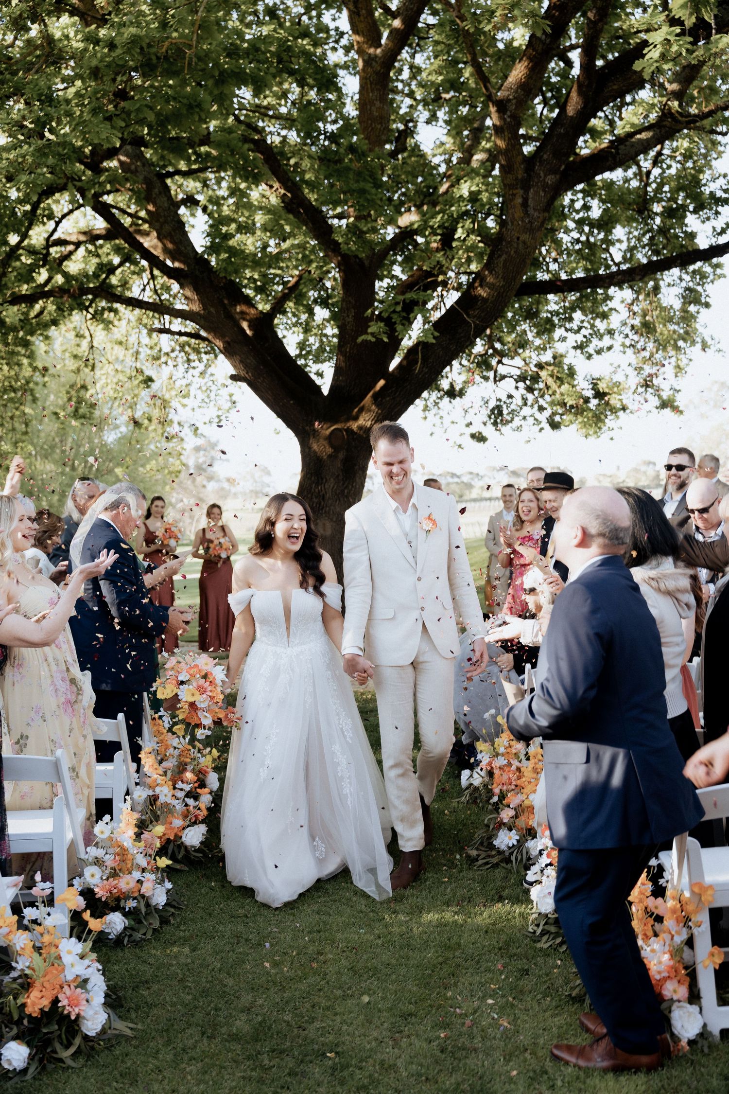 Confetti ceremony exit at Howards Vineyard in the Adelaide hills by Braytmedia