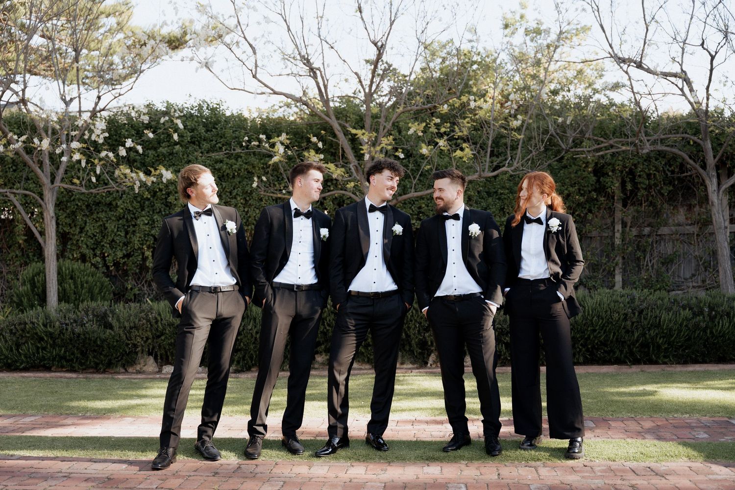 A sequence of wedding party photos shows groomsmen posing playfully in formal attire outdoors at the alton house images by braytmedia