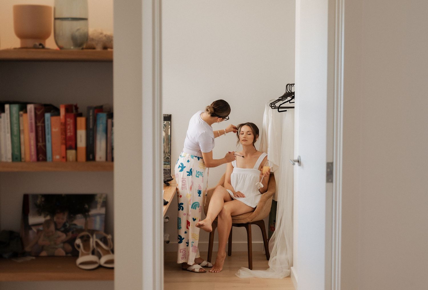 Interior hallway view with casual wedding day preparations.
