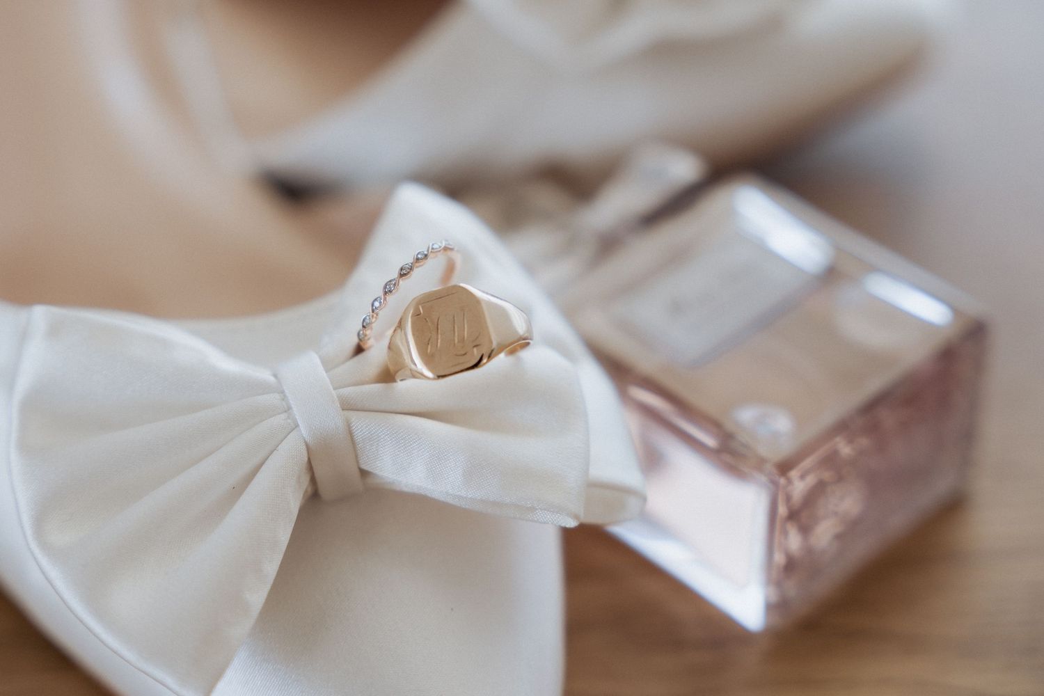 White satin bow against a soft blurred background images by braytmedia