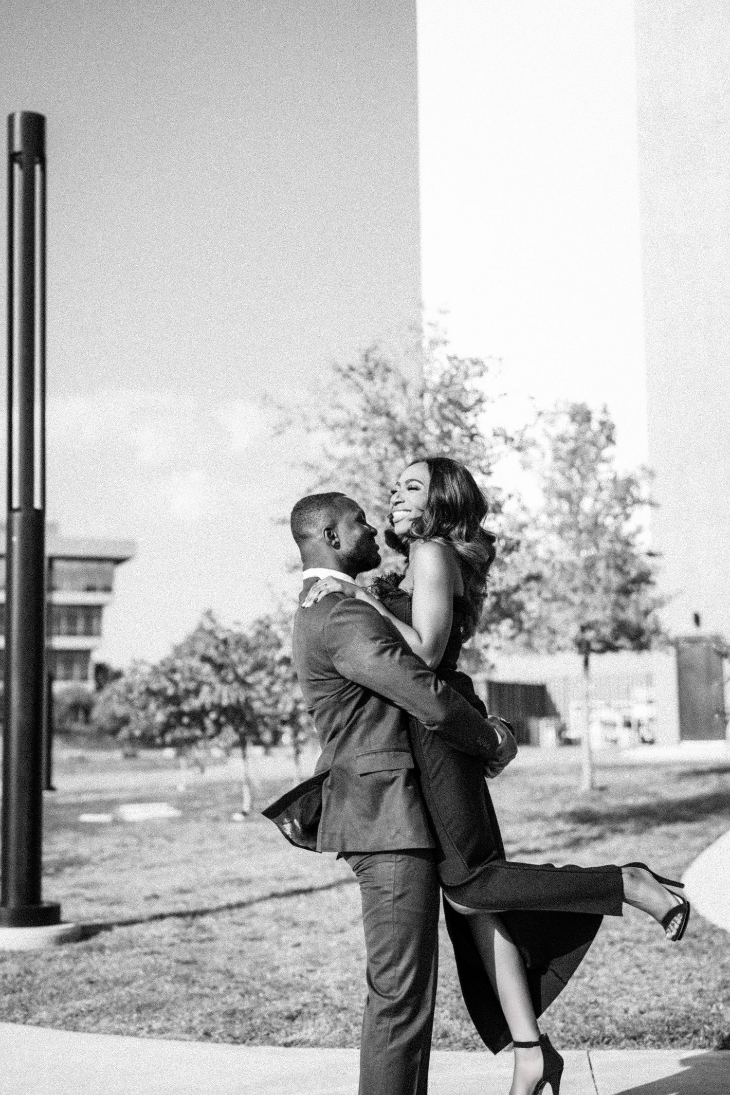 Black and white photos of couple dancing and embracing outdoors.