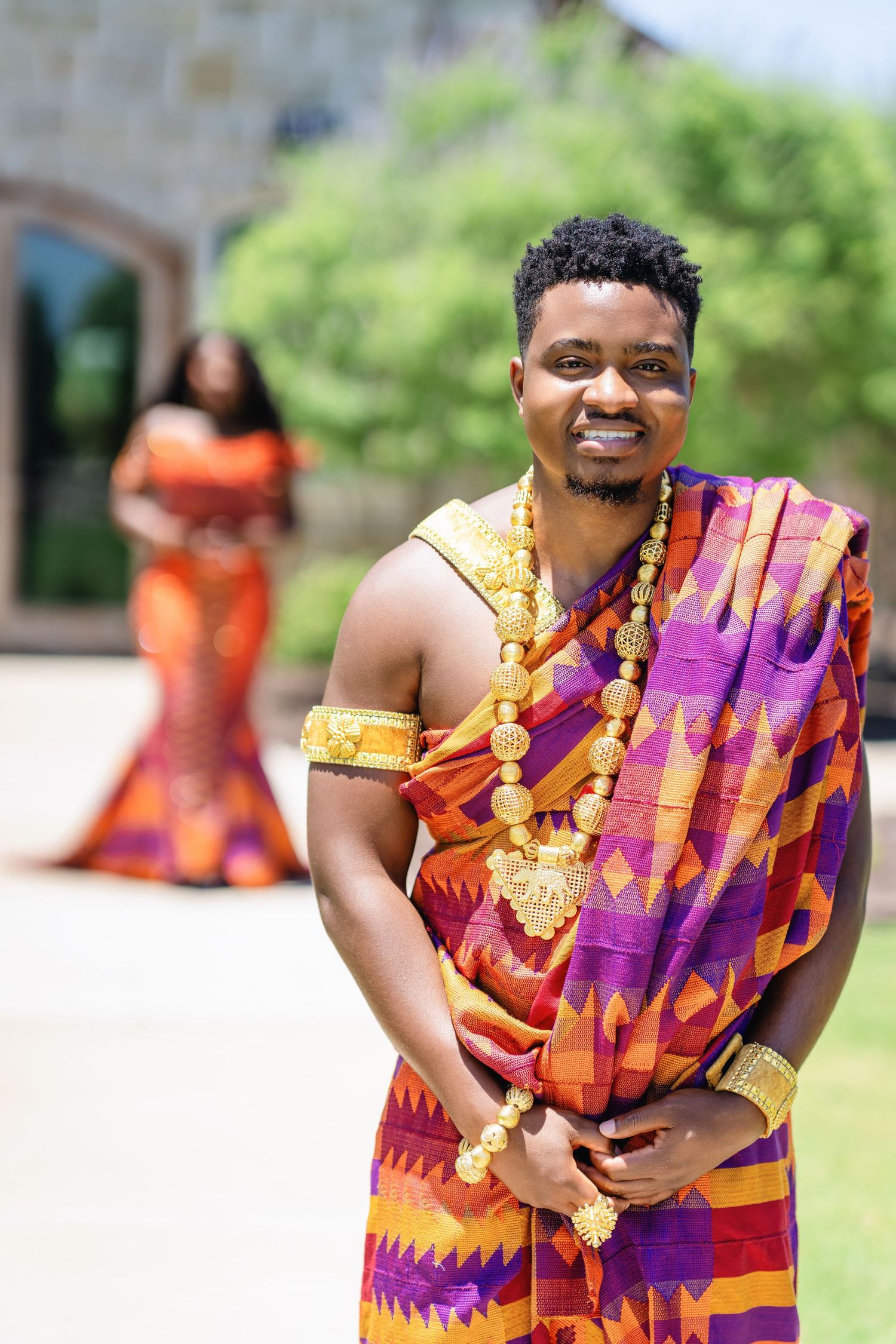Colorful traditional African formal wear in orange and purple displayed in multiple poses.