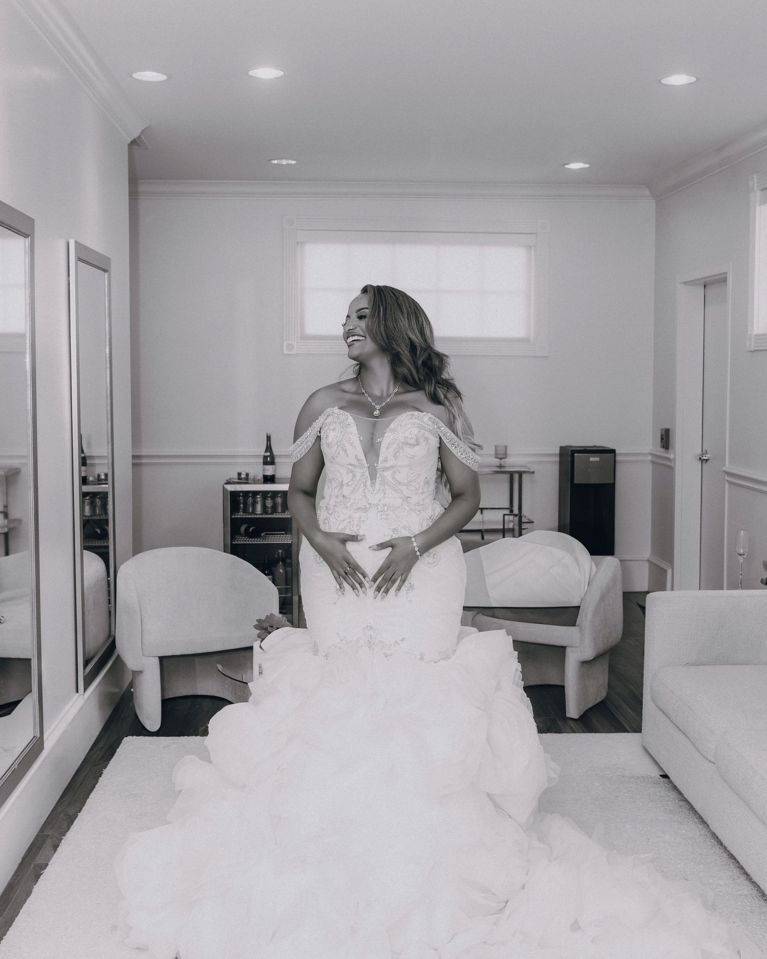 Wedding dress shots showing flowing white gowns in an elegant indoor setting with natural light.