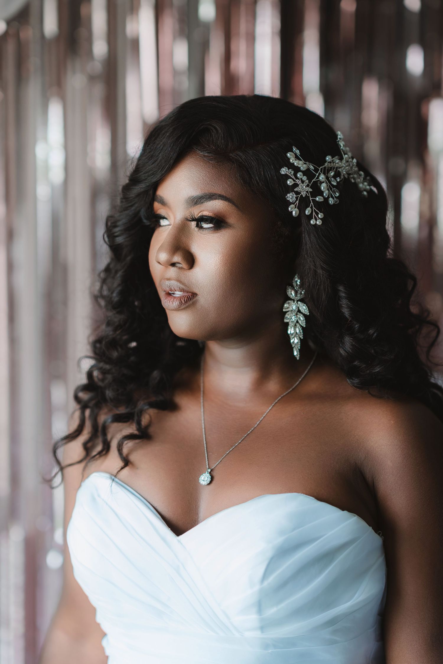 Close-up bridal portraits showing elegant jewelry and white gown details against a soft bokeh background.