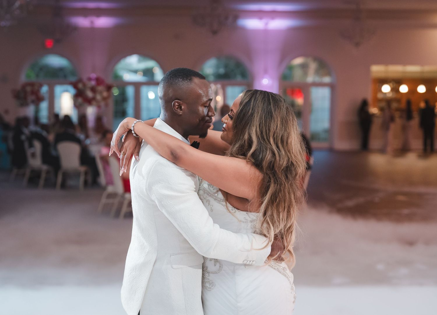 Newlyweds share an intimate dance moment on their wedding day.