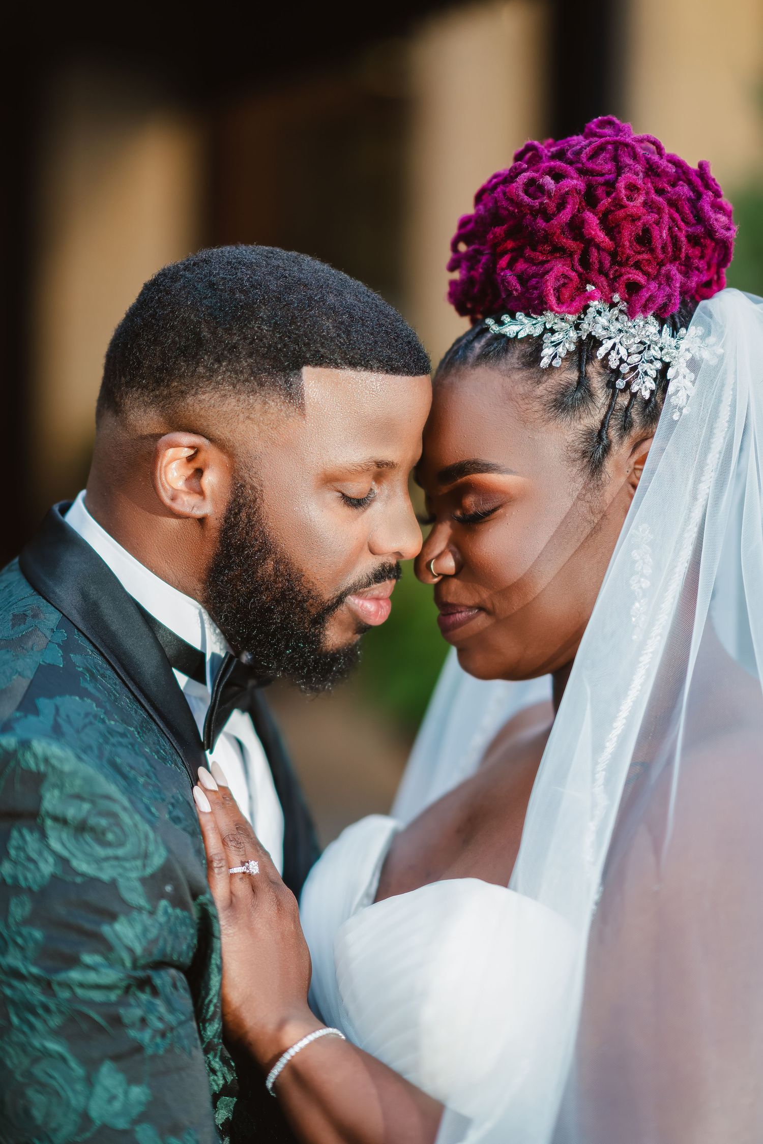 Intimate close-up wedding portraits showing tender moments between newlyweds.