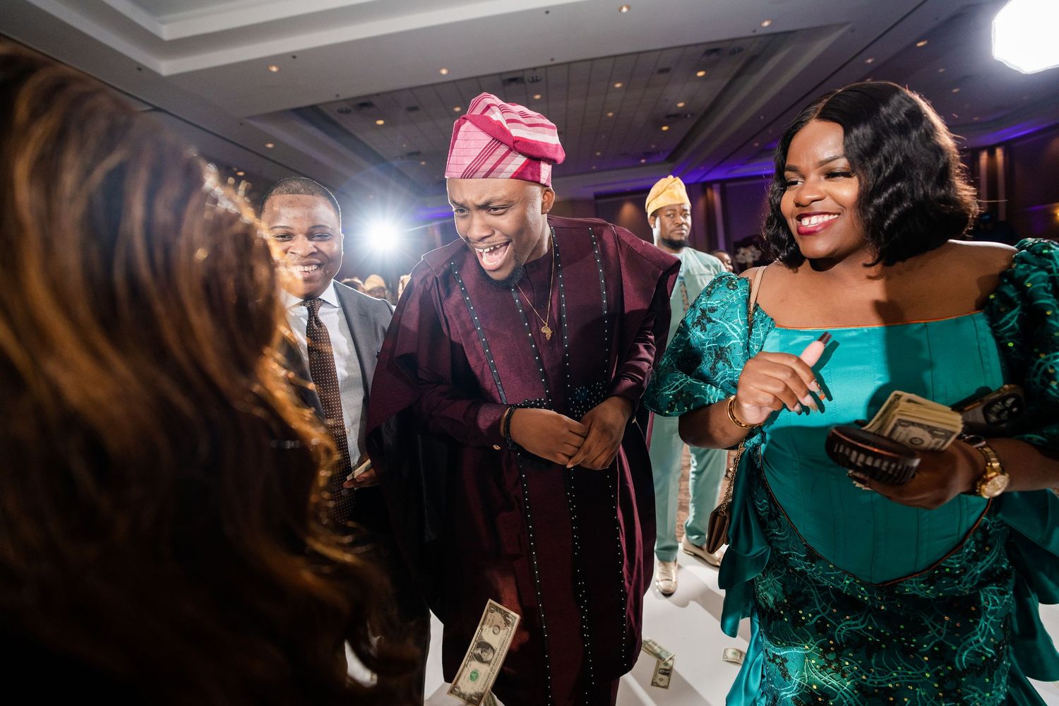 A sequence of candid reception photos showing guests dancing and celebrating at an indoor event.
