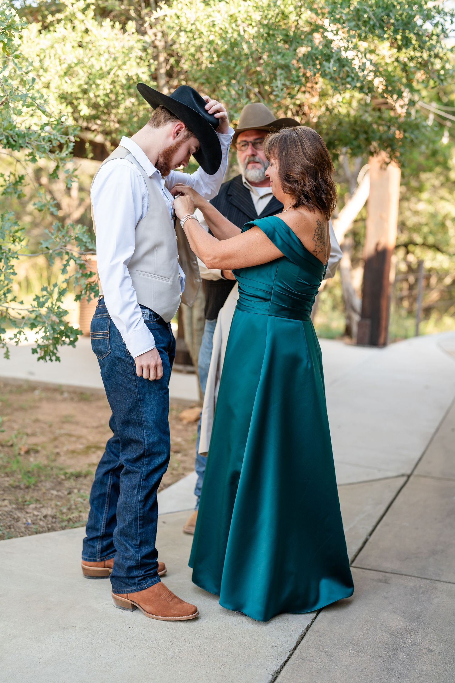 Candid moments of a dance between two people on a paved outdoor area.