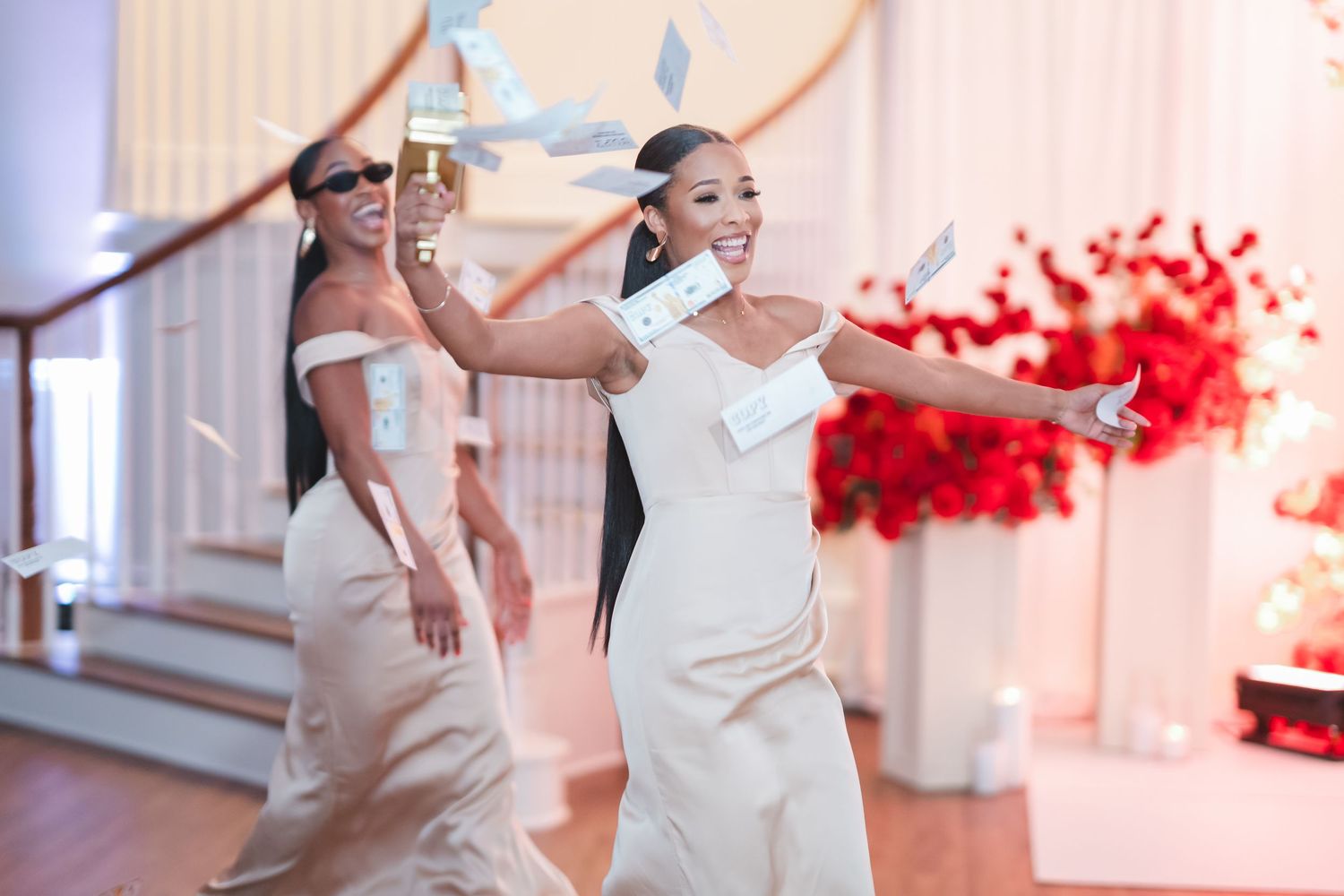 Wedding celebration sequence with dancing and movement in a light-filled room.
