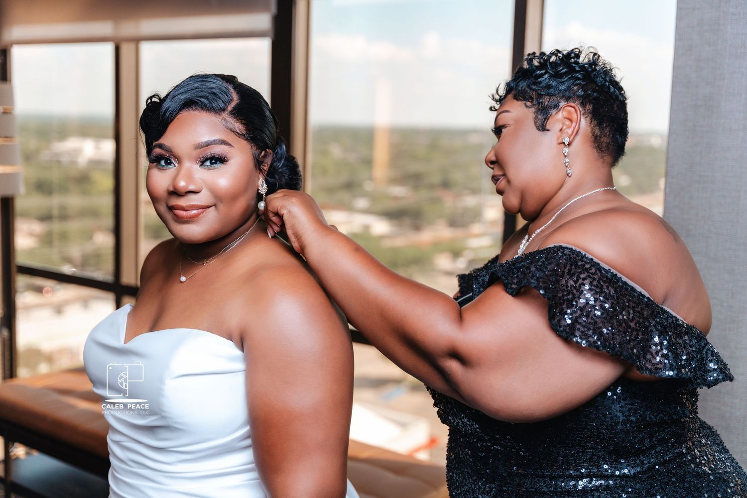 Wedding party members in formal attire during celebration.