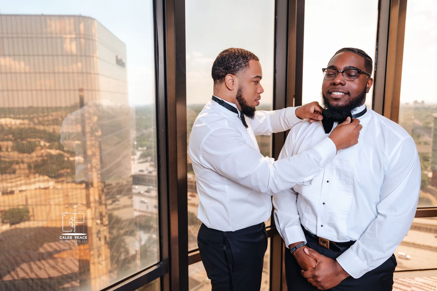 Groom preparation series showing final touches before ceremony against city backdrop.