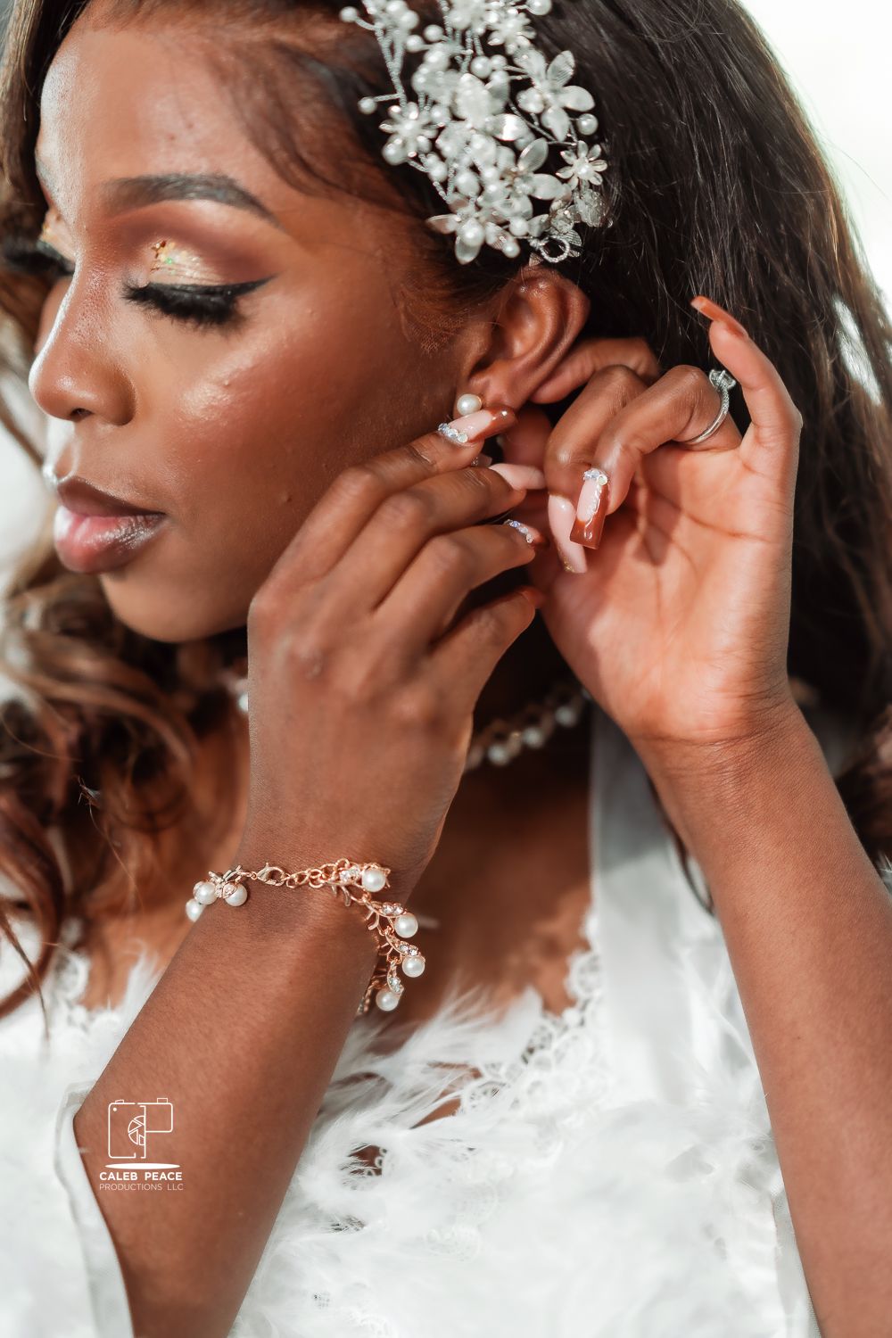Close-up shots of a bride wearing delicate white floral hair accessories and elegant makeup.