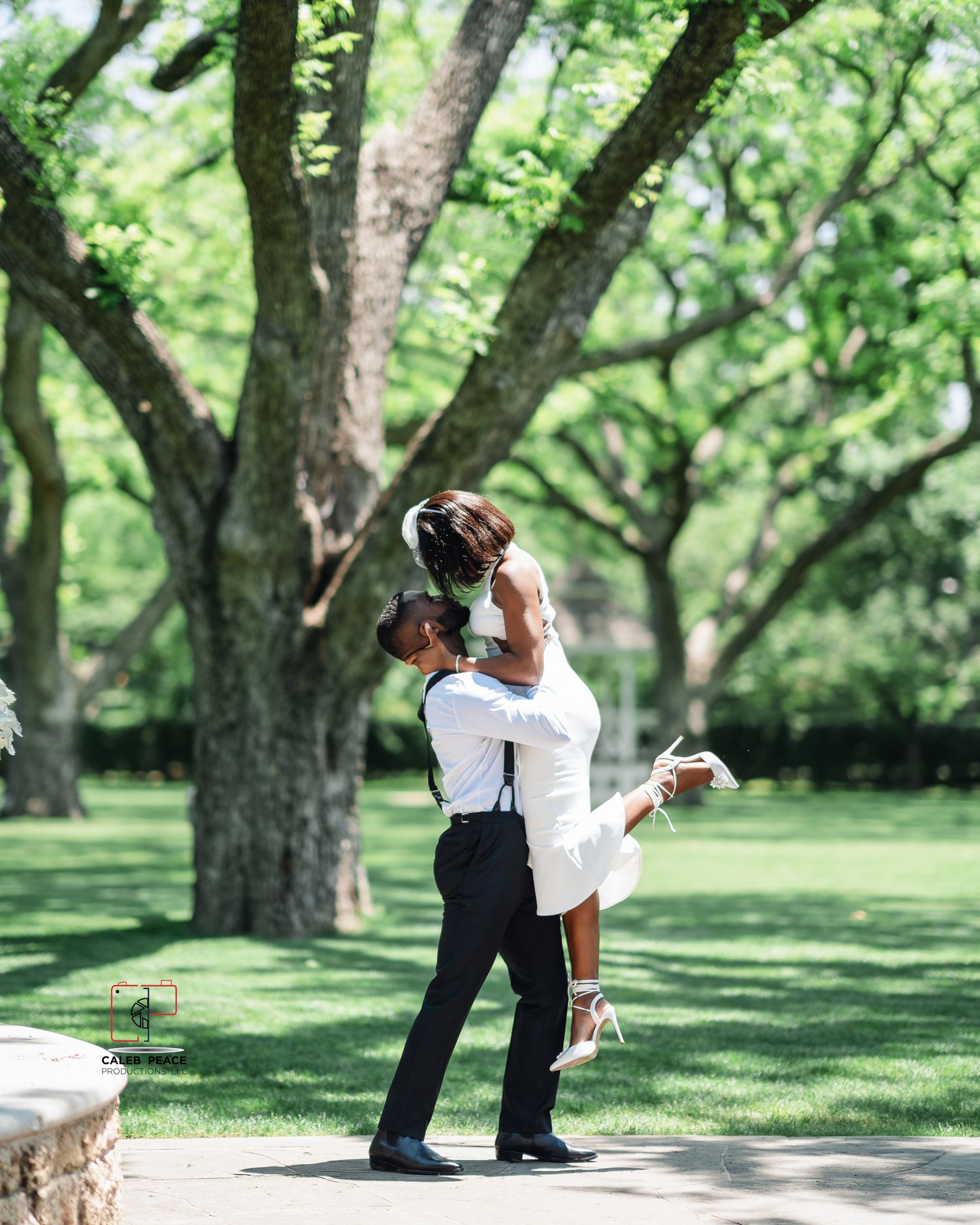 Playful wedding couple photoshoot sequence under green trees in a park.