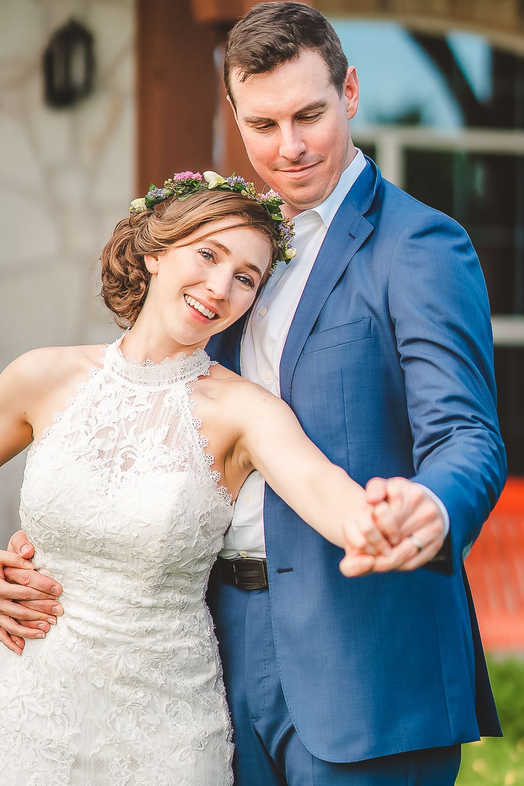 Romantic wedding dance photos showing tender moments between a couple in formal attire.