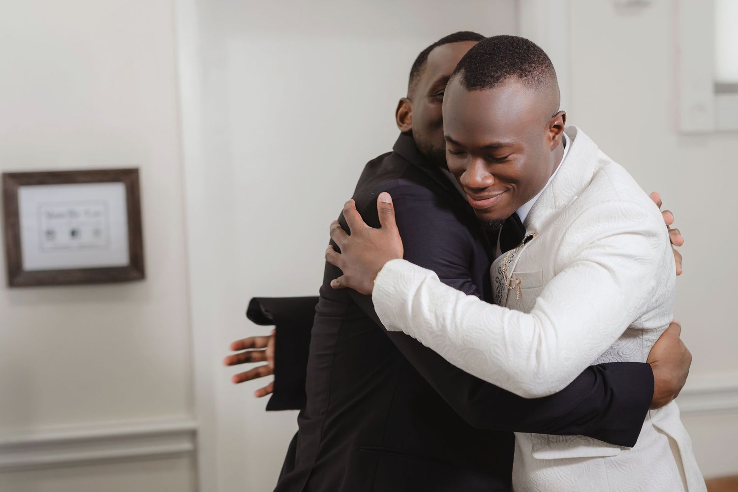 Heartfelt embraces shared between wedding guests during an emotional celebration.
