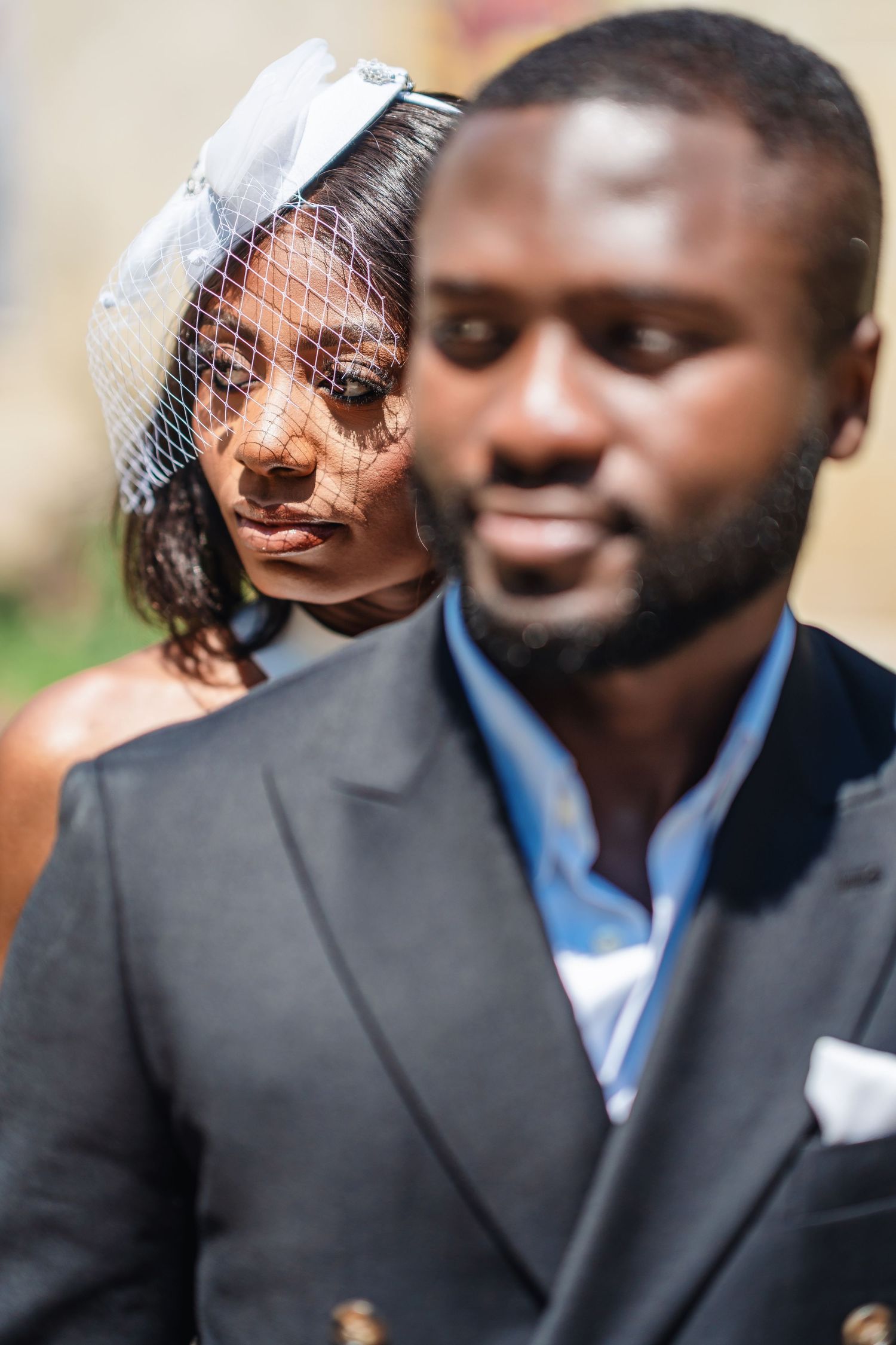 Close-up wedding portrait showing tender intimate moments between the newlyweds.