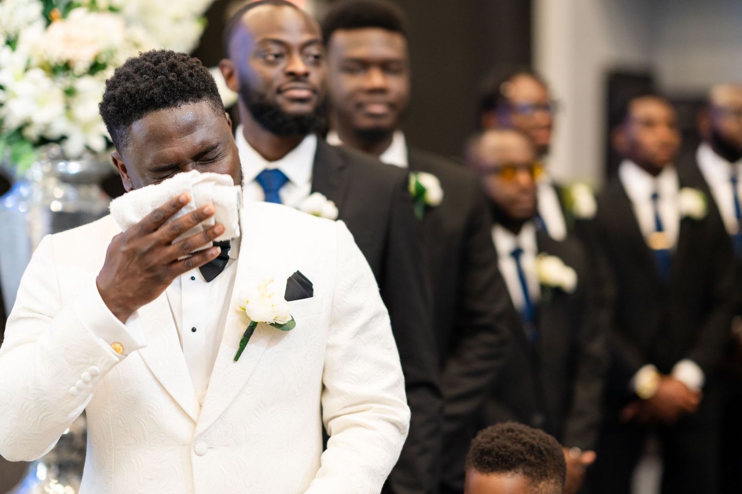 Wedding ceremony reactions showing emotional moments.