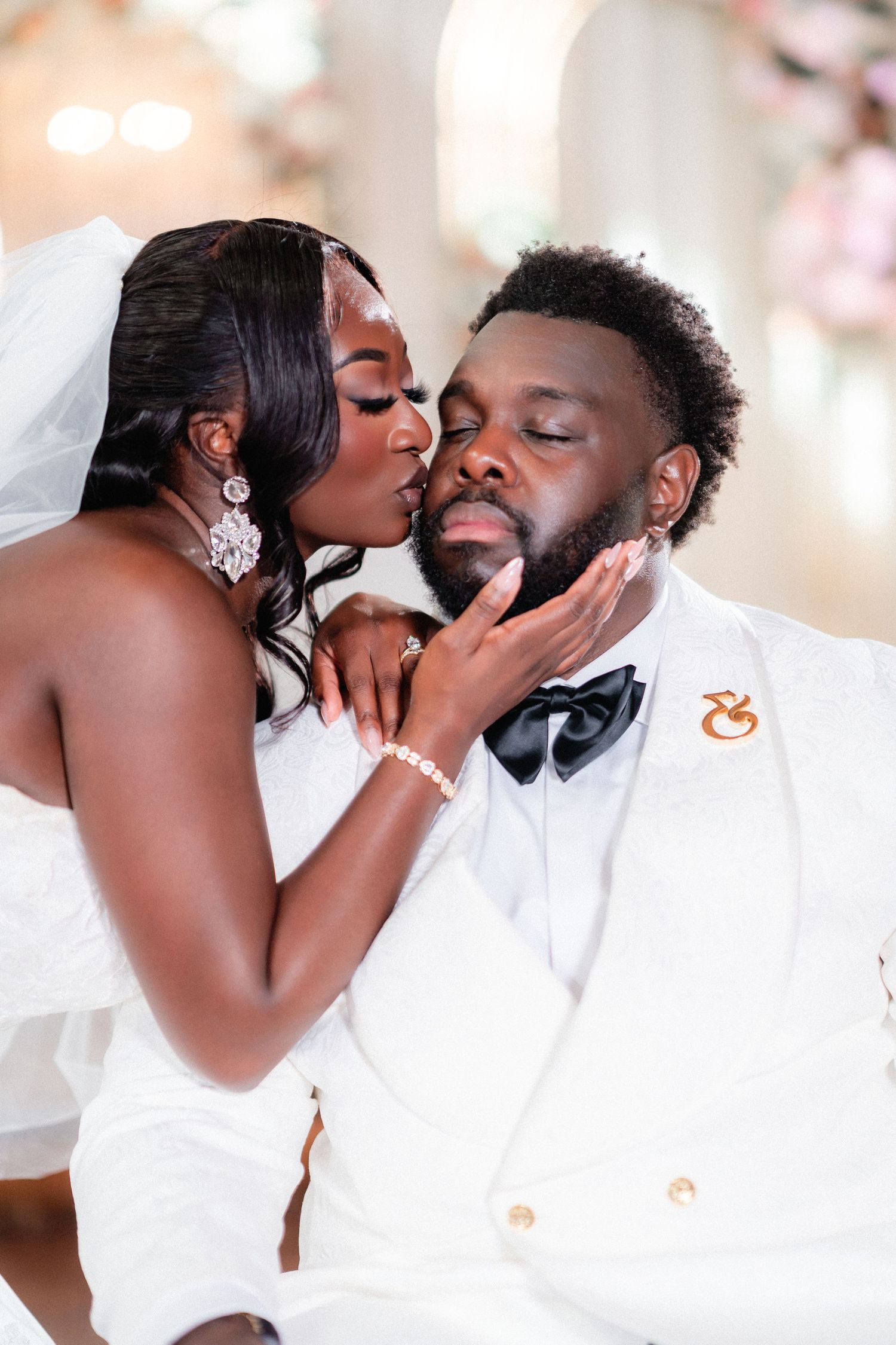 Romantic wedding couple shares intimate moments in a series of tender portrait shots.