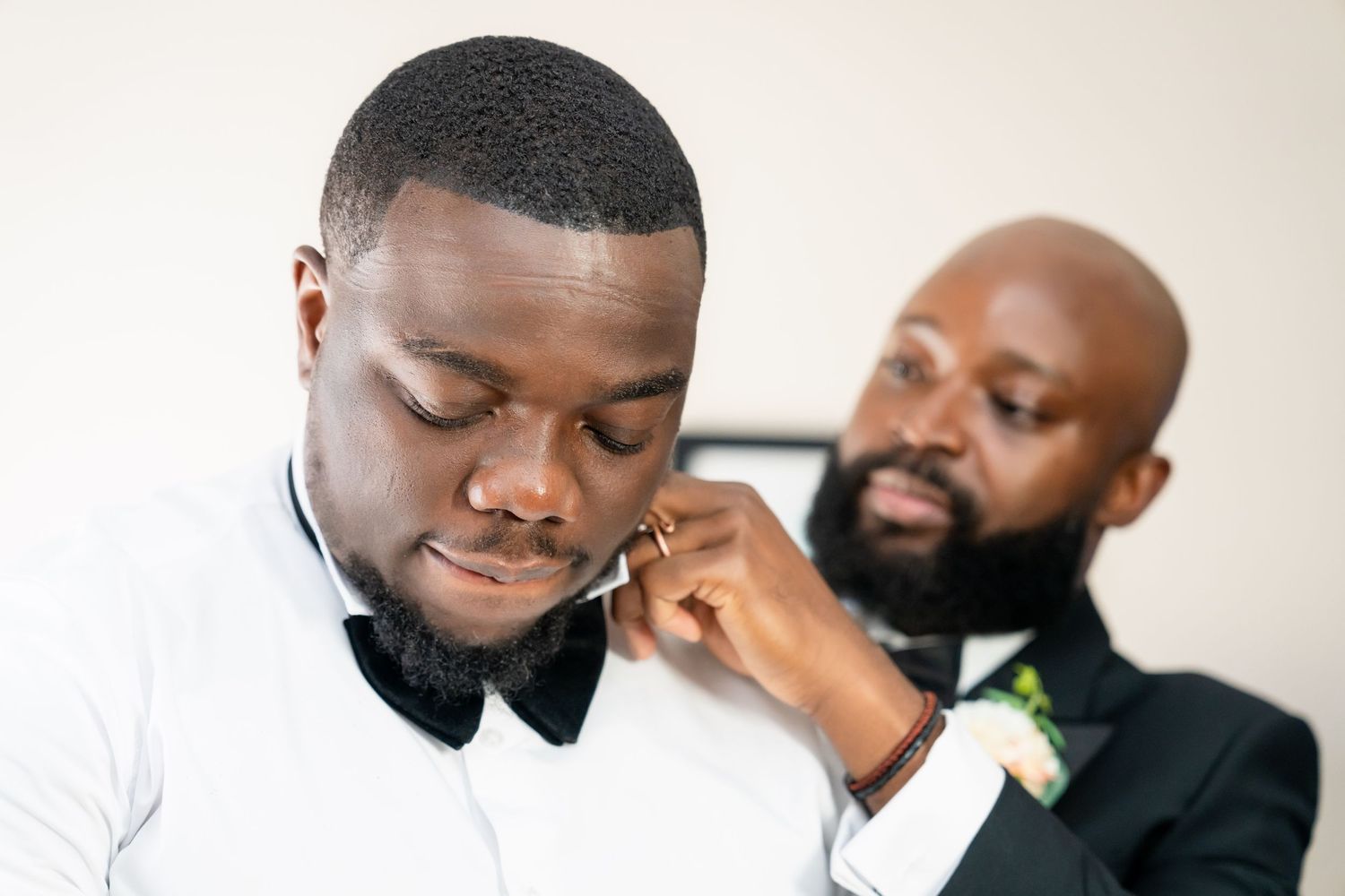 Emotional moments captured during formal event preparation.
