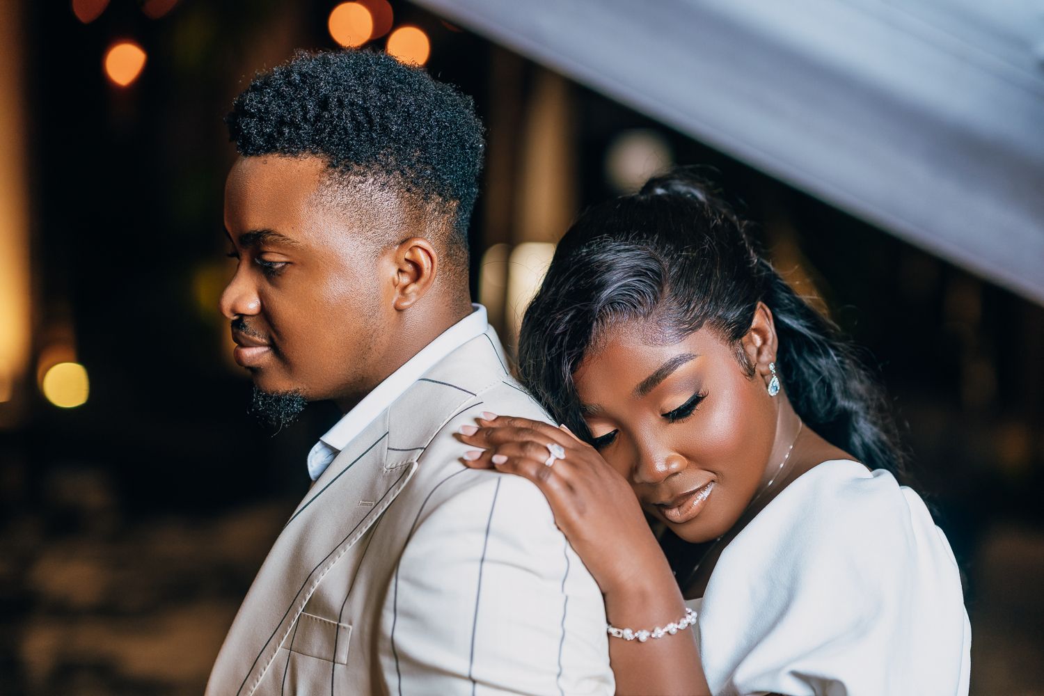 Couple shares intimate moments during their evening portrait session.