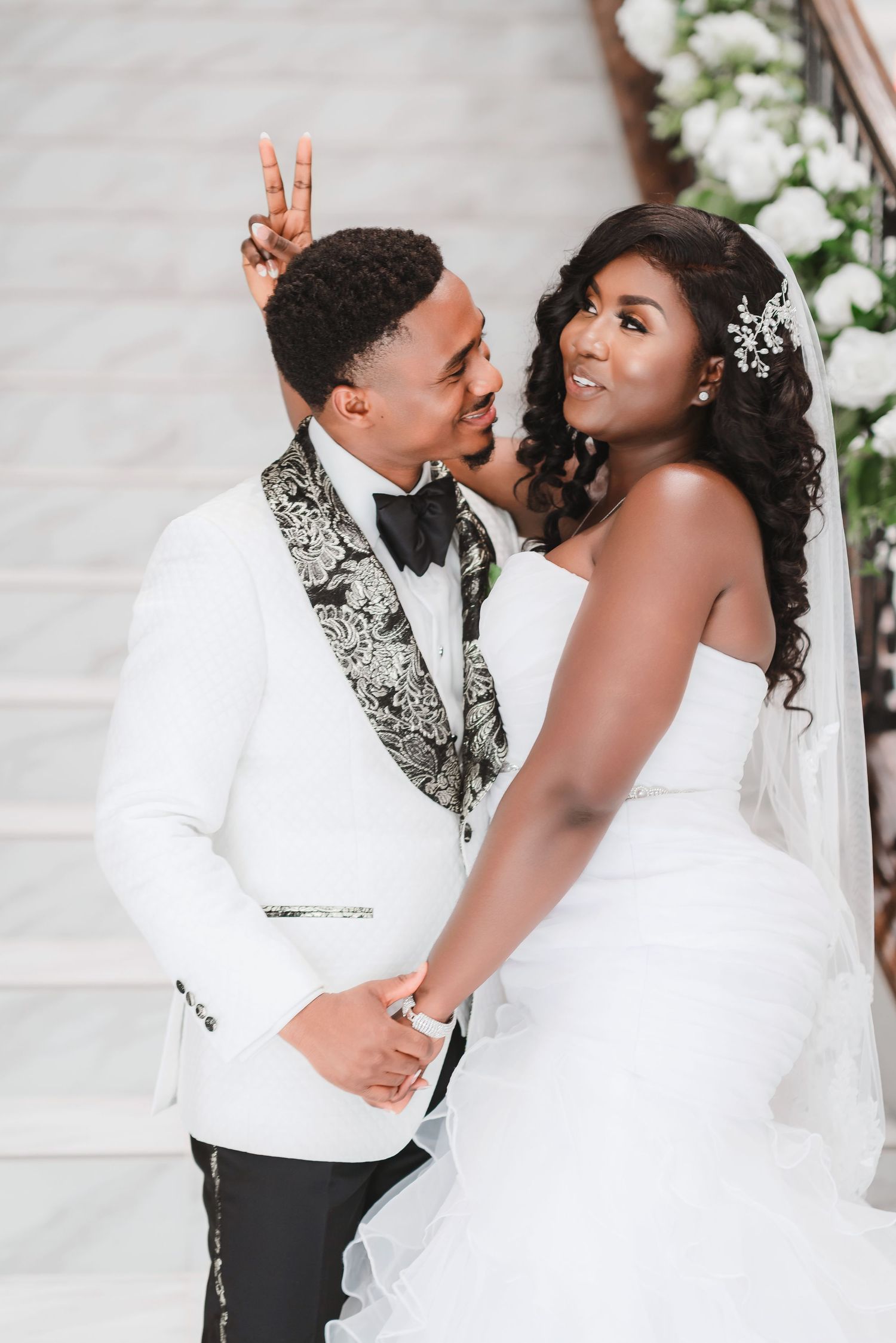 A series of romantic wedding portraits showing a couple in white attire sharing intimate moments against a light backdrop.