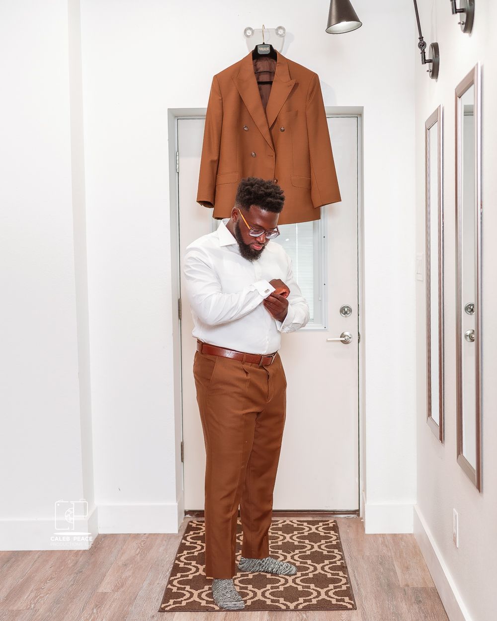 Fashion styling sequence showing brown suit jacket and white shirt combinations in a hallway.