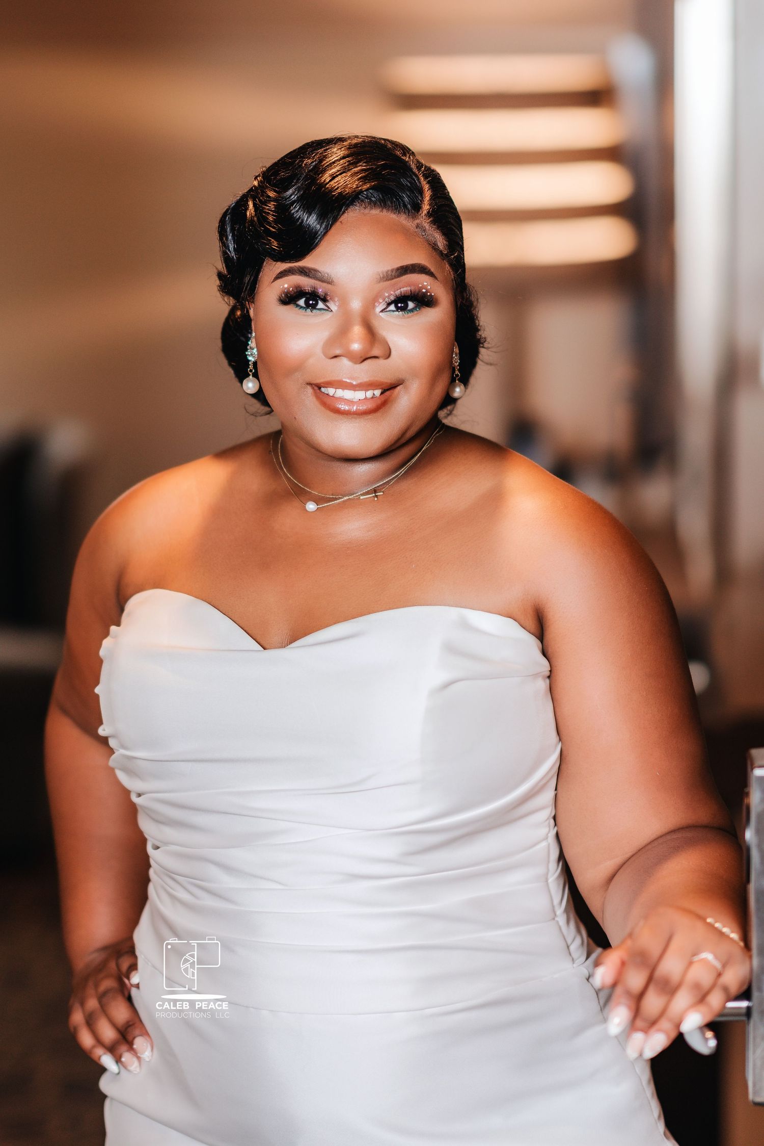 Wedding portrait series showing a bride in a strapless white gown against a warm-toned background.