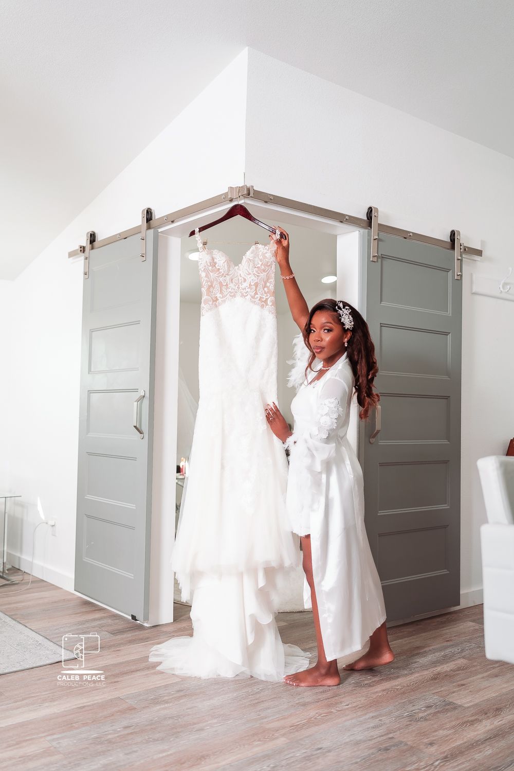 Wedding dress preparation sequence against grey doors in bright white room.