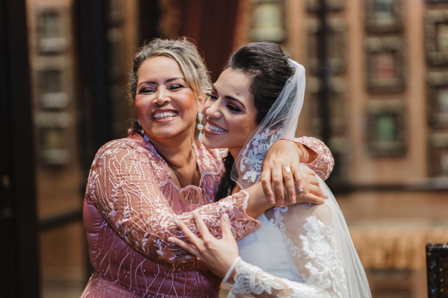 Wedding guests share emotional moments during celebration.