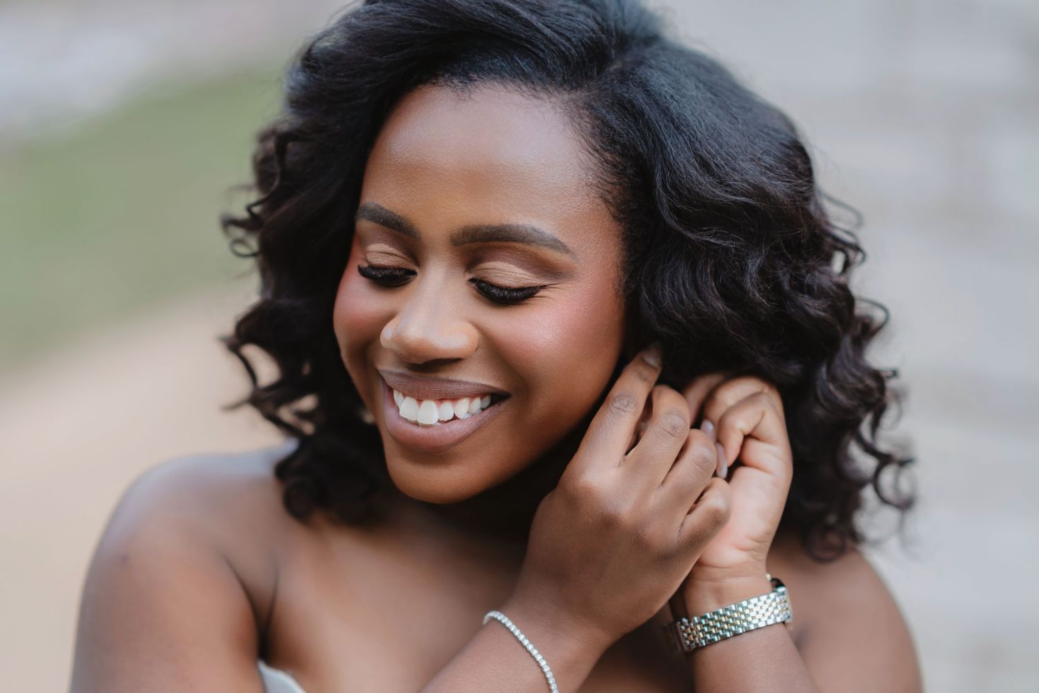 A collection of romantic outdoor engagement photos showing a couple embracing and laughing together in natural light.
