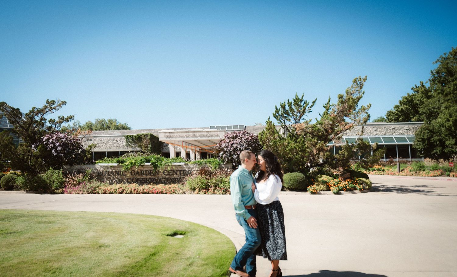 A scenic coastal wedding venue with ocean views and elegant outdoor seating arrangements for a ceremony.