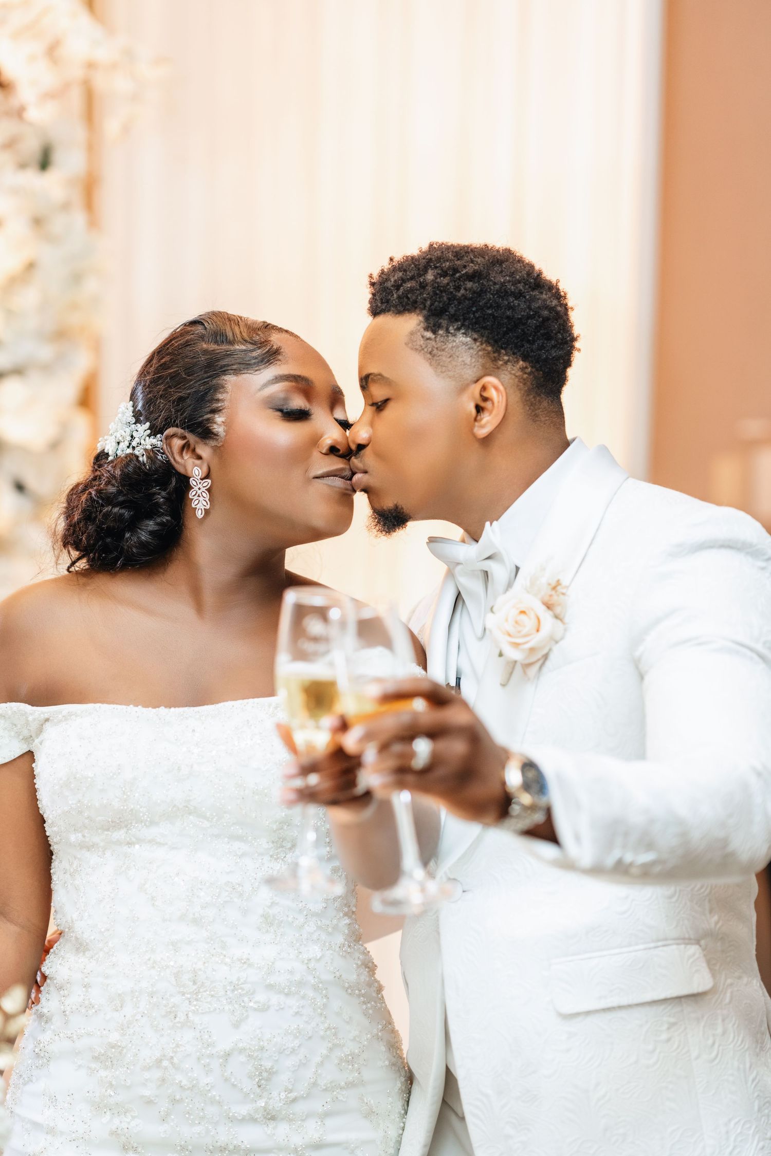 Romantic wedding reception moments captured in champagne toast sequence.