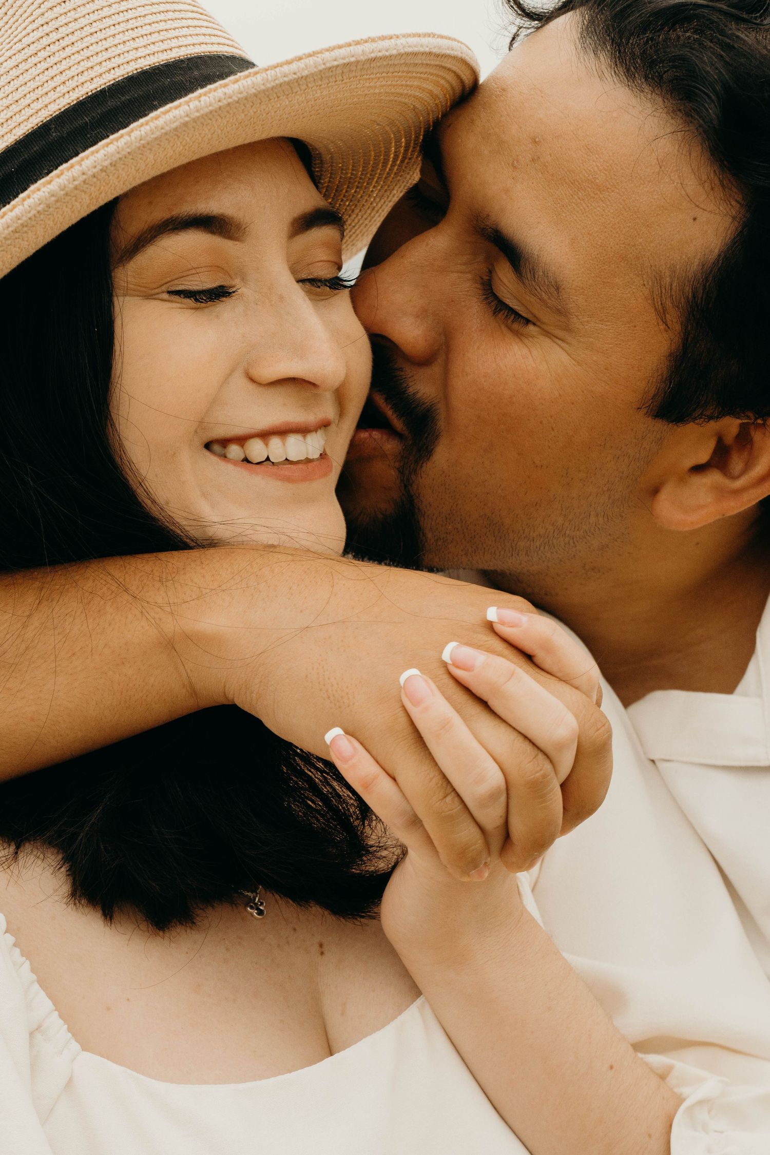 Engagement photo shoot with Los Angeles skyline at dusk
