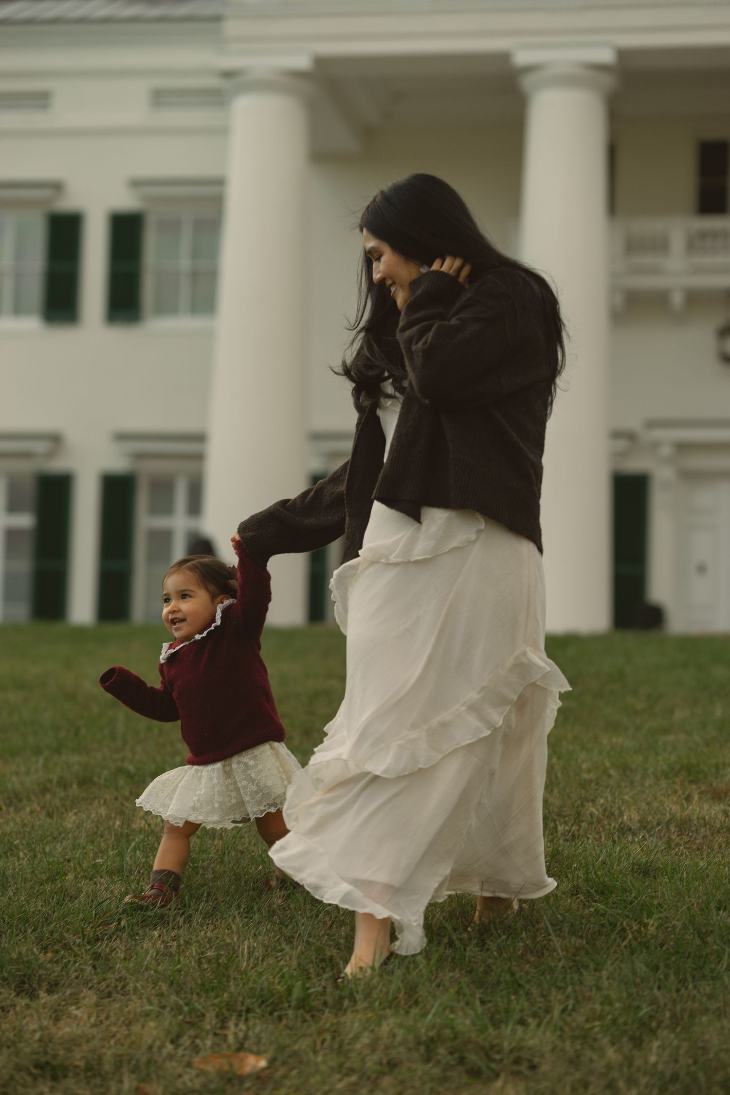 Artistic sequence showing flowing white dresses in motion against a classic building backdrop. Leesburg, Virginia