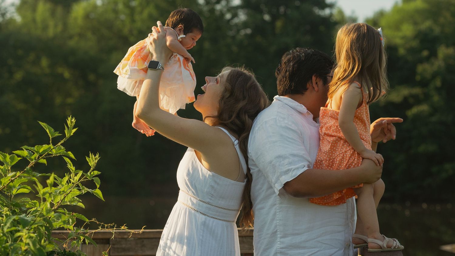 Sunset panorama capturing intimate moments in a golden meadow.