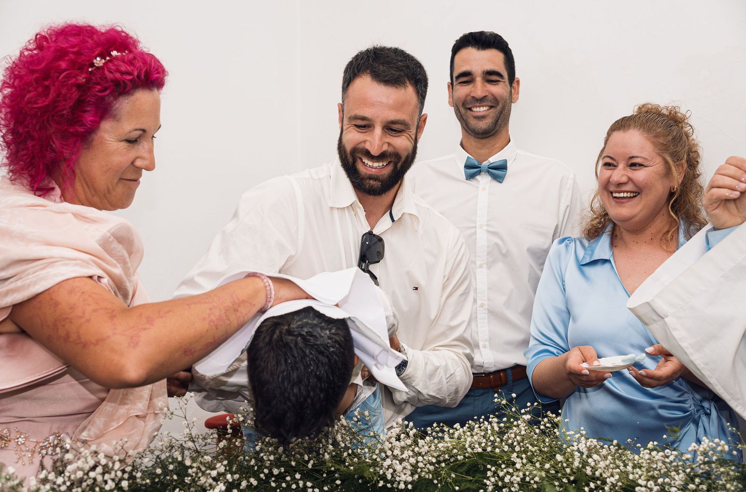 Casual group portrait session showing joyful interactions and laughter.