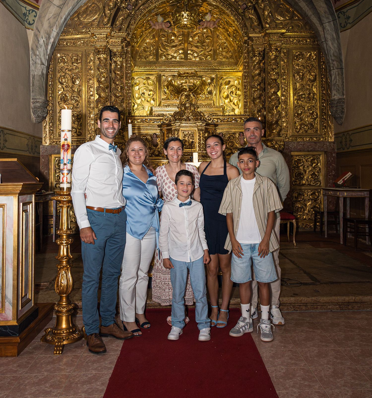 Group photos taken inside an ornate golden church or cathedral interior.