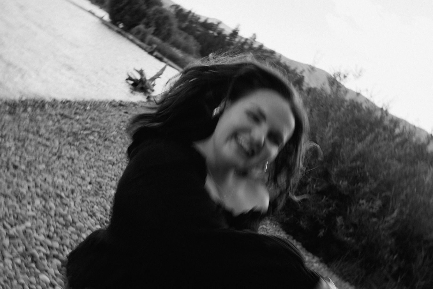 Black and white portrait series by the waterfront.