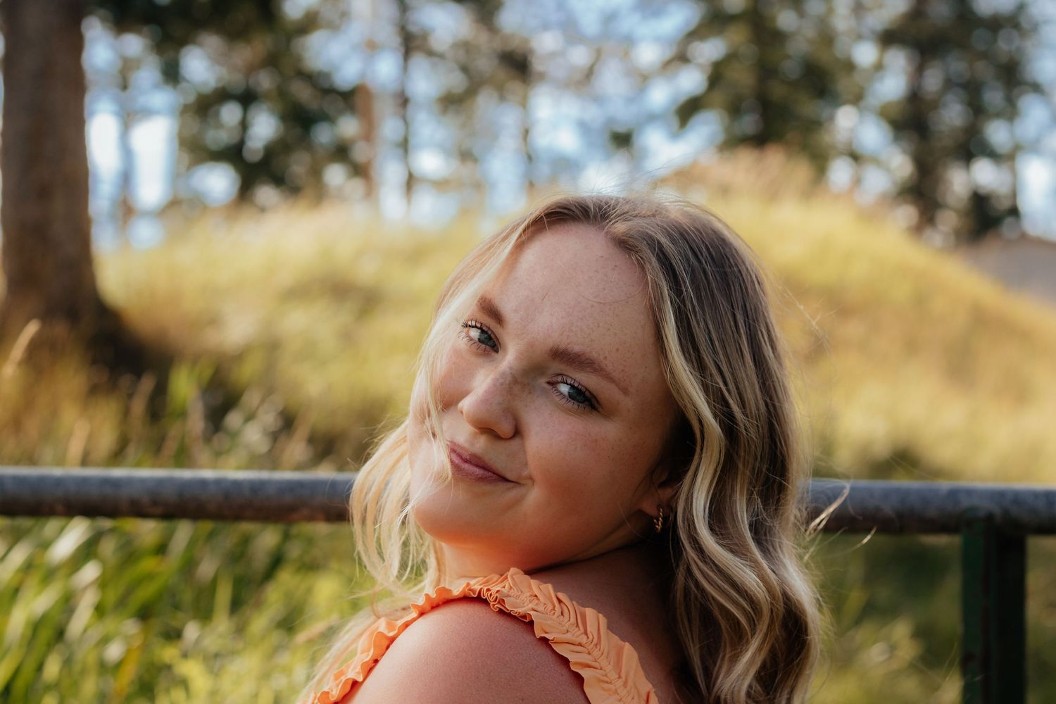 A series of outdoor portrait photographs showing someone in warm sunlight against natural backdrops.