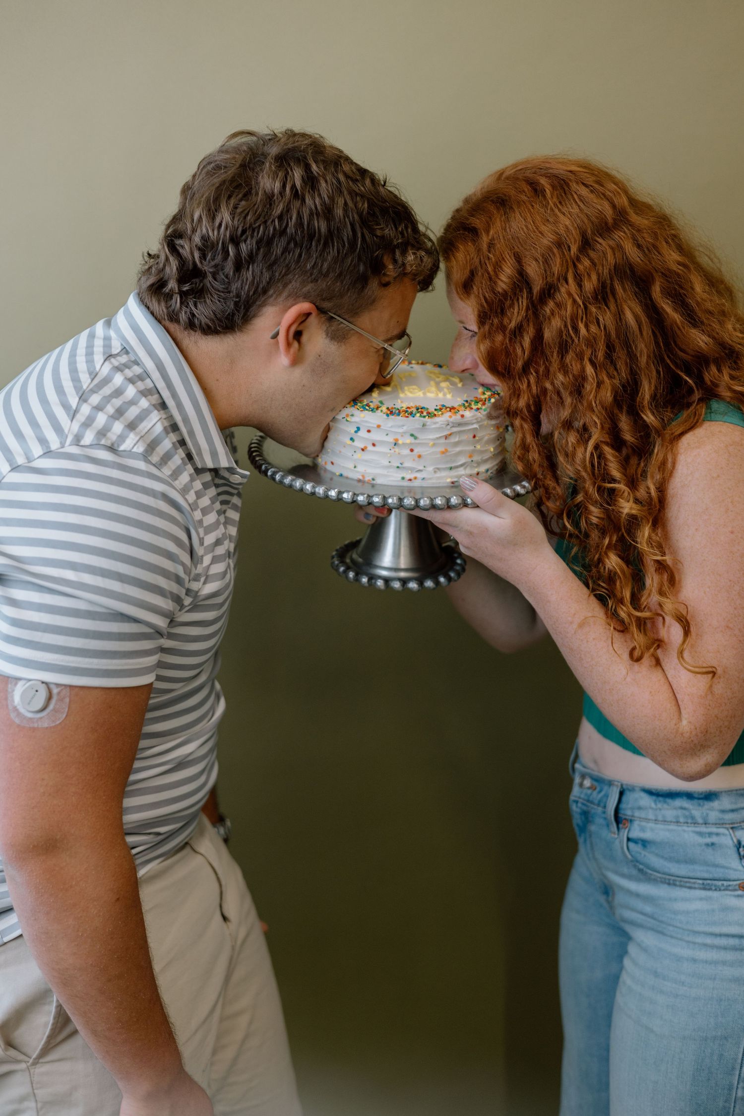 Close-up sequence of a couple in striped shirt and floral top sharing tender moments.