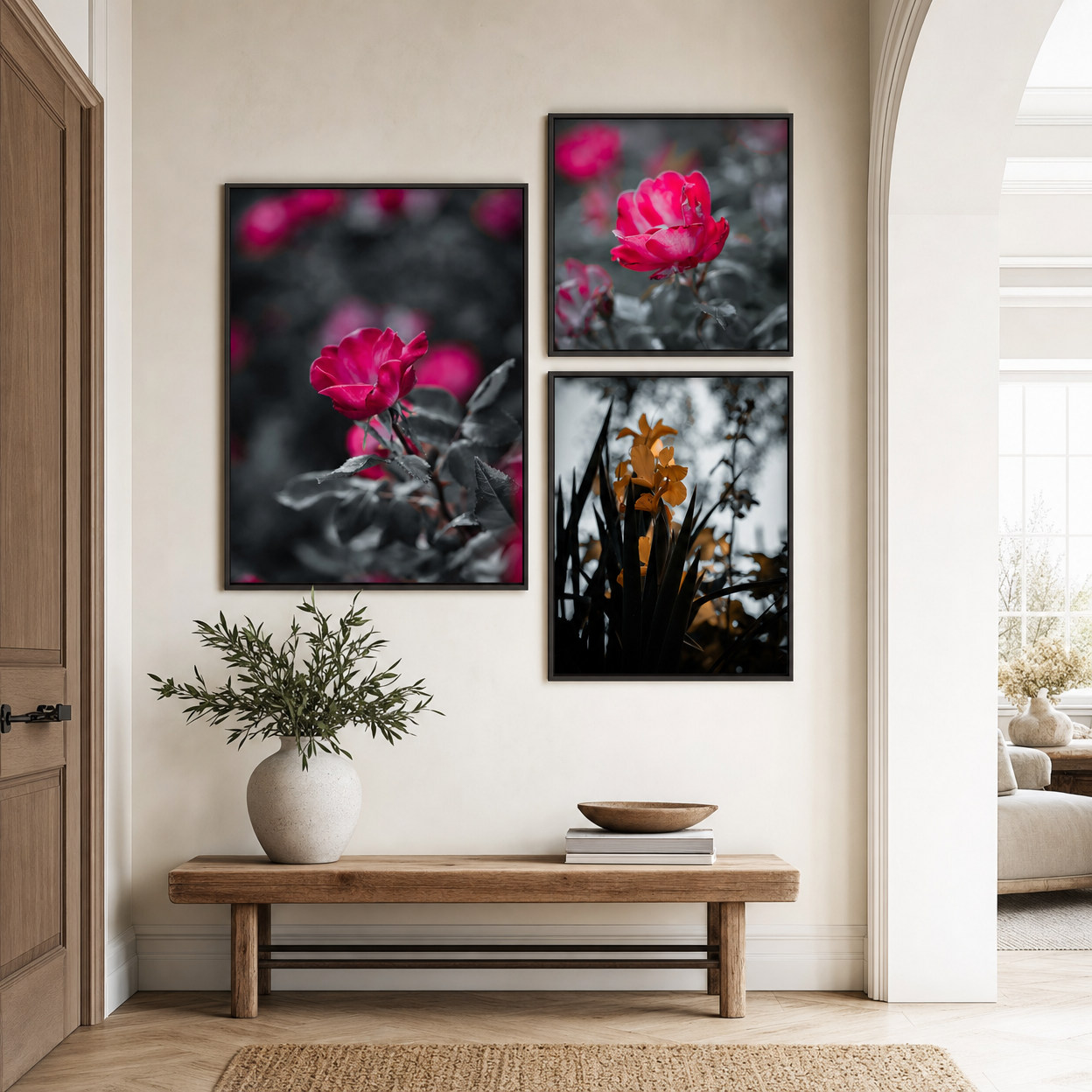 Three framed botanical photos with pink roses and yellow flowers in black and white on a beige hallway wall.