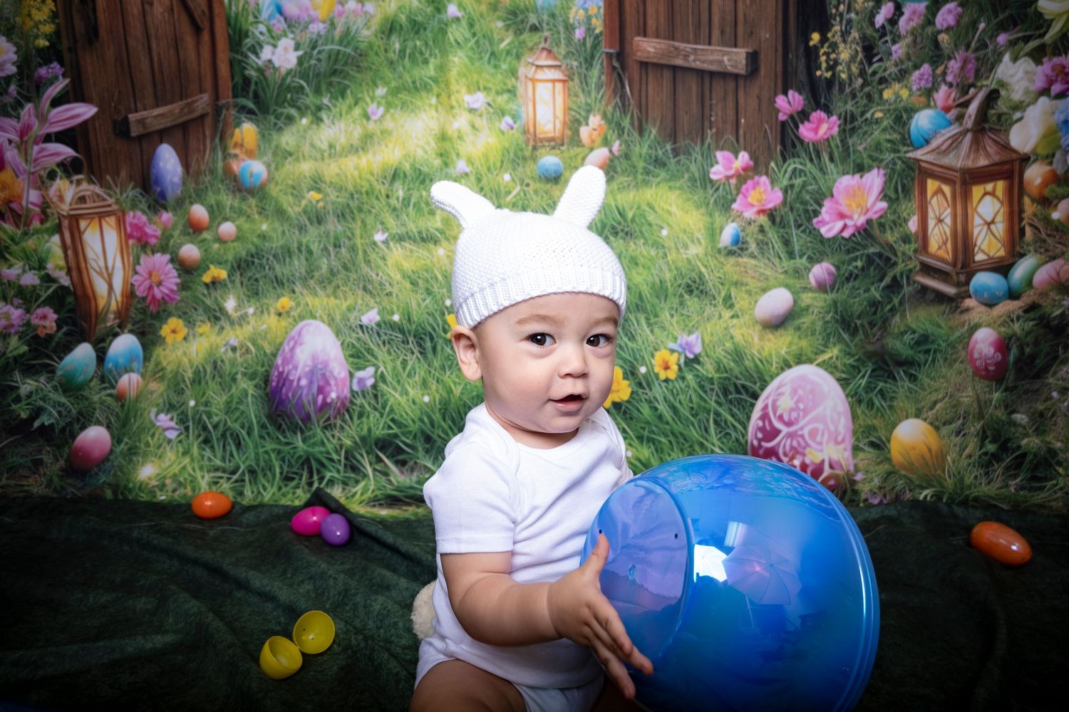 Baby holding a blue Easter egg in a whimsical spring garden set by a Central Florida Photographer.