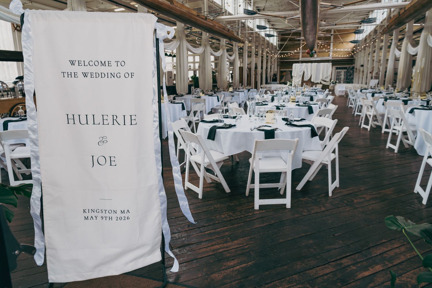 Wedding reception venue banner welcoming guests to the wedding of Hulerie and Joe in Kingston, MA.