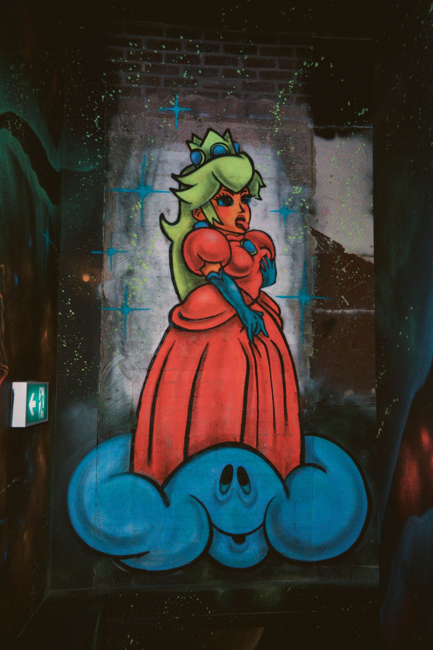 Custom blacklight graffiti mural glowing under neon UV lights at NQ64 Soho.