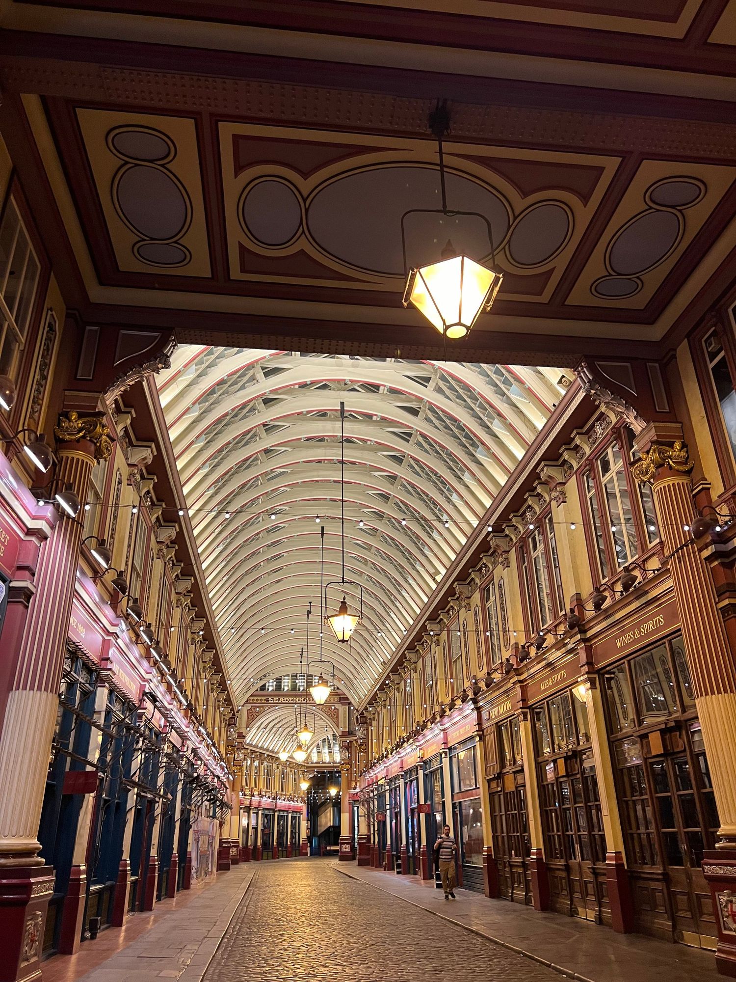 Symmetric architectural photography of a historic covered arcade street in London, shot by commercial photographer ARIETA Studios.