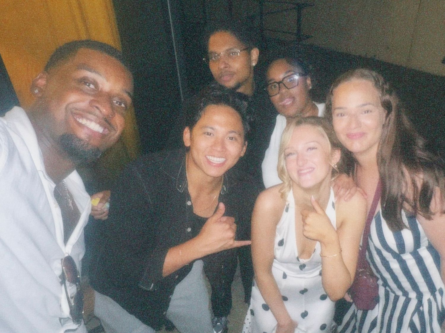 Group of friends celebrating together at Amelia Hurst 21st birthday event by ARIETA Studios.