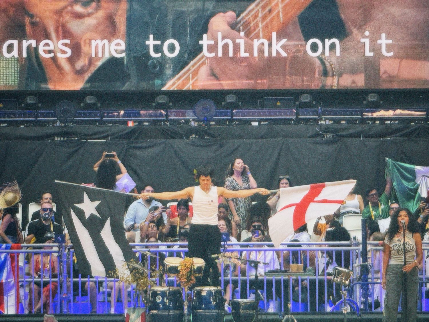 Crowd cheering in front of main festival stage captured by ARIETA Studios.